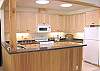 Fully equipped kitchen with a gas cook stove.