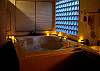 Second View - Upper level - Master bathroom with Jacuzzi tub and large shower.