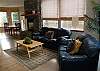 Lower level - Living room with TV/DVD and gas fireplace.