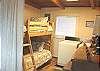 Spare sleeping area off the kitchen area with a Twin bunk bed.