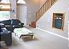 Third view - Lower level - Living room with TV/DVD and gas fireplace.