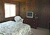 Second view - Upper level - Master Bedroom with Queen bed and TV/DVD.