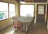 Upper level - Dining table for 8 with spectacular ocean views.