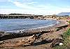 View of beach at high tide.