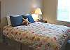 Upper level - Bedroom with Queen bed and TV.