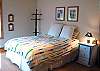 Lower level - Bedroom with a Queen bed.
