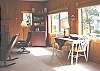 Third view of Living room with small table and books!