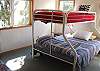 Lower level - Bedroom with Twin/Double bunk bed and Twin bed.