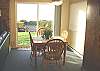 Dining table for 4 with ocean views.
