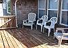 North facing front deck with patio furniture.