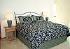Master Bedroom on Third Floor with King bed and Balcony with Ocean Views