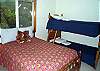 Upper level - Bedroom with a Double bed and a Twin Bunk bed.