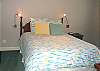 Master Bedroom with Queen bed and TV.