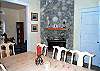 Second view of Dining room with double sided fireplace