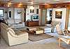 Living room with TV/DVD and spectacular ocean/bay views.