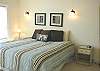 Upper level - Master bedroom with a King bed, Cable TV and a private bathroom with a large garden/soaker tub and shower.
