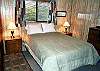 Upper level bedroom with Queen bed.