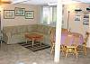 Downstairs Family Room with TV, Table for 4, Twin/Double Bunk Bed and a Hide-a-bed for additional sleeping.