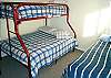Bedroom with a Twin/Double Bunk bed and Twin bed.