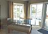 Custom made dining table for 5 with ocean views.