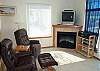 Living room on Second Floor with TV/DVD/VCR, Electric Fireplace and Futon