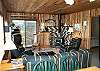 Upper level living room with TV/DVD/VCR, wood stove, hide-a-bed for addtiona sleeping and ocean views.