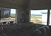 View of ocean front the kitchen and the dining table.