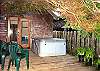 Semi private Hot tub on large back deck.  Access from kitchen and master bedroom.  Large grassy backyard.