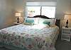 Master bedroom with a King bed and private bathroom with shower.
