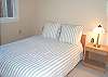 Lower level Bedroom with Queen bed and flat screen TV/DVD