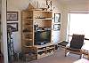 Middle level - Family room with double futon, flat screen TV/VCR/DVD, XM radio, wet bar and ocean views.