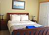 Upper level - Bedroom with a Queen bed.