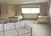 Second view - Upper level - Large bedroom with four twins, a hide-a-bed for additional sleeping and a TV/VCR - Great room for the kids!