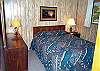 Upper level bedroom with Queen bed.