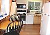 Dining table for 2 with 4 extra chairs.