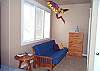 Second view - Upper level - Bedroom with a King bed and Double size futon with TV/DVD.