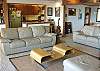 Third view - Living room with TV/DVD and spectacular ocean/bay views.