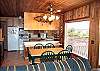Dining table for 6 and breakfast bar for 4.