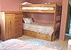 Second view of downstairs bedroom with Queen bed and Twin bunk bed.