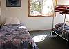 Second view - Lower level - Bedroom with Twin/Double bunk bed and Twin bed.