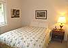 Lower (entry) level - Bedroom with a Queen bed (TV).
