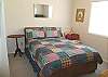 Lower (entry) level - Bedroom with a Double bed (TV).