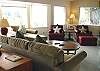 Living room with TV/VCR, fireplace and hide-a-bed for addtional sleeping.