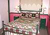 Dowstairs Bedroom with a Queen Bed.