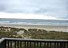 View of ocean from the upper level Queen bedroom.