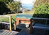 View of hot tub and bay from the deck.