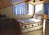 Third Floor Bedroom with Queen bed and Balcony with Views