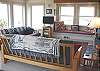 Upper level-Living room with flat screen TV/DVD, CD stereo, wood stove insert and spectacular ocean views.