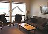 Second view - Middle level - Family room with double futon, flat screen TV/VCR/DVD, XM radio, wet bar and ocean views.