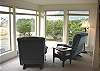 Upper Level - Living room with TV/DVD, sitting/reading area, view of Neahkahnie Mountain.